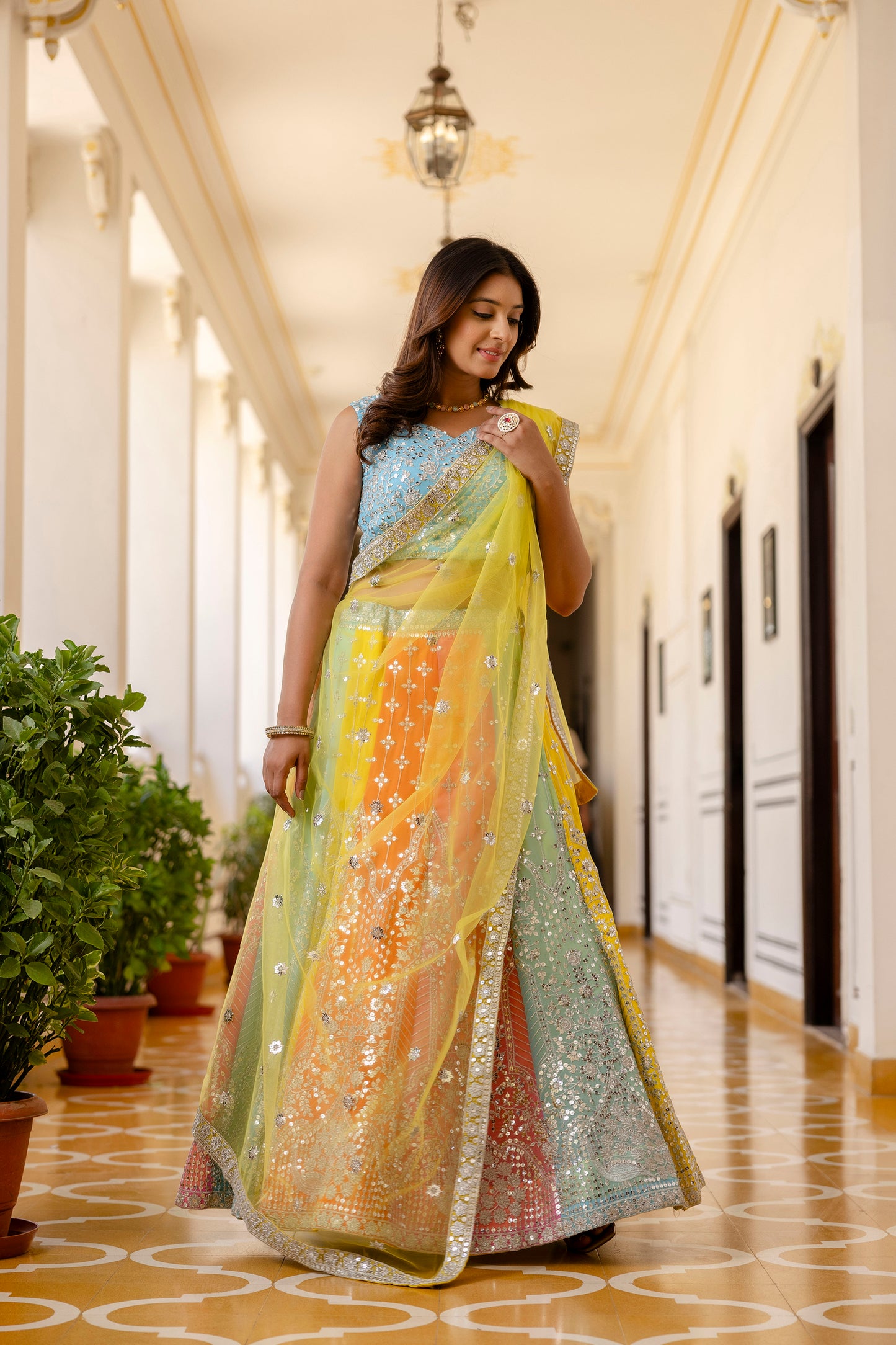 Multicolored Faux Georgette Sequins Thread Embroidered Lehenga Choli