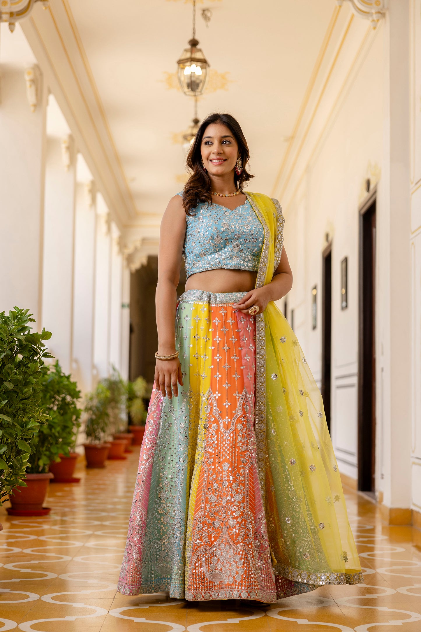 Multicolored Faux Georgette Sequins Thread Embroidered Lehenga Choli