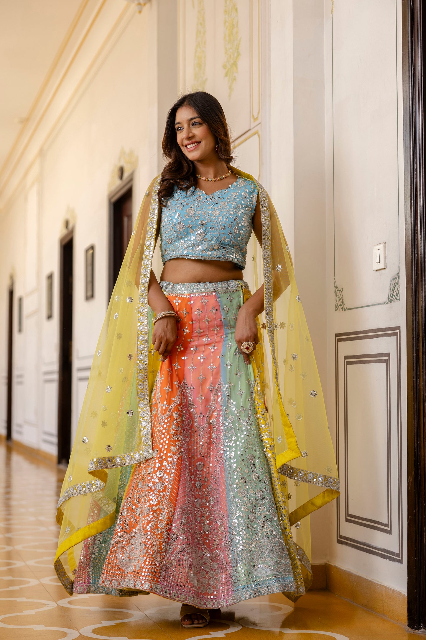 Multicolored Faux Georgette Sequins Thread Embroidered Lehenga Choli