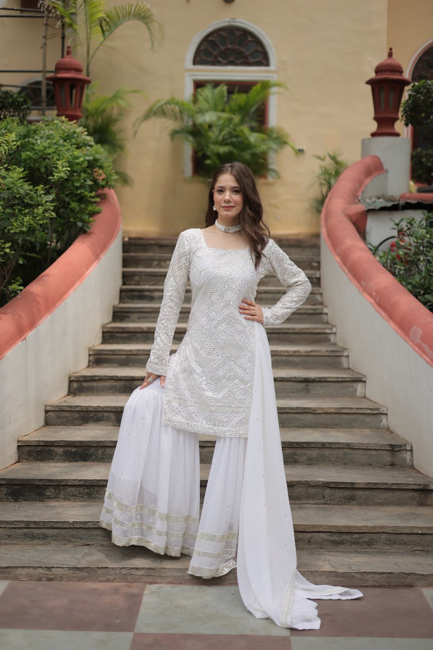 Mesmerizing Faux Georgette Sequins Thread Worked Top Sharara Suit - Ethnicwish