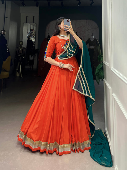 Magnificent Orange Pure Rayon Embossed Navratri Lehenga Choli