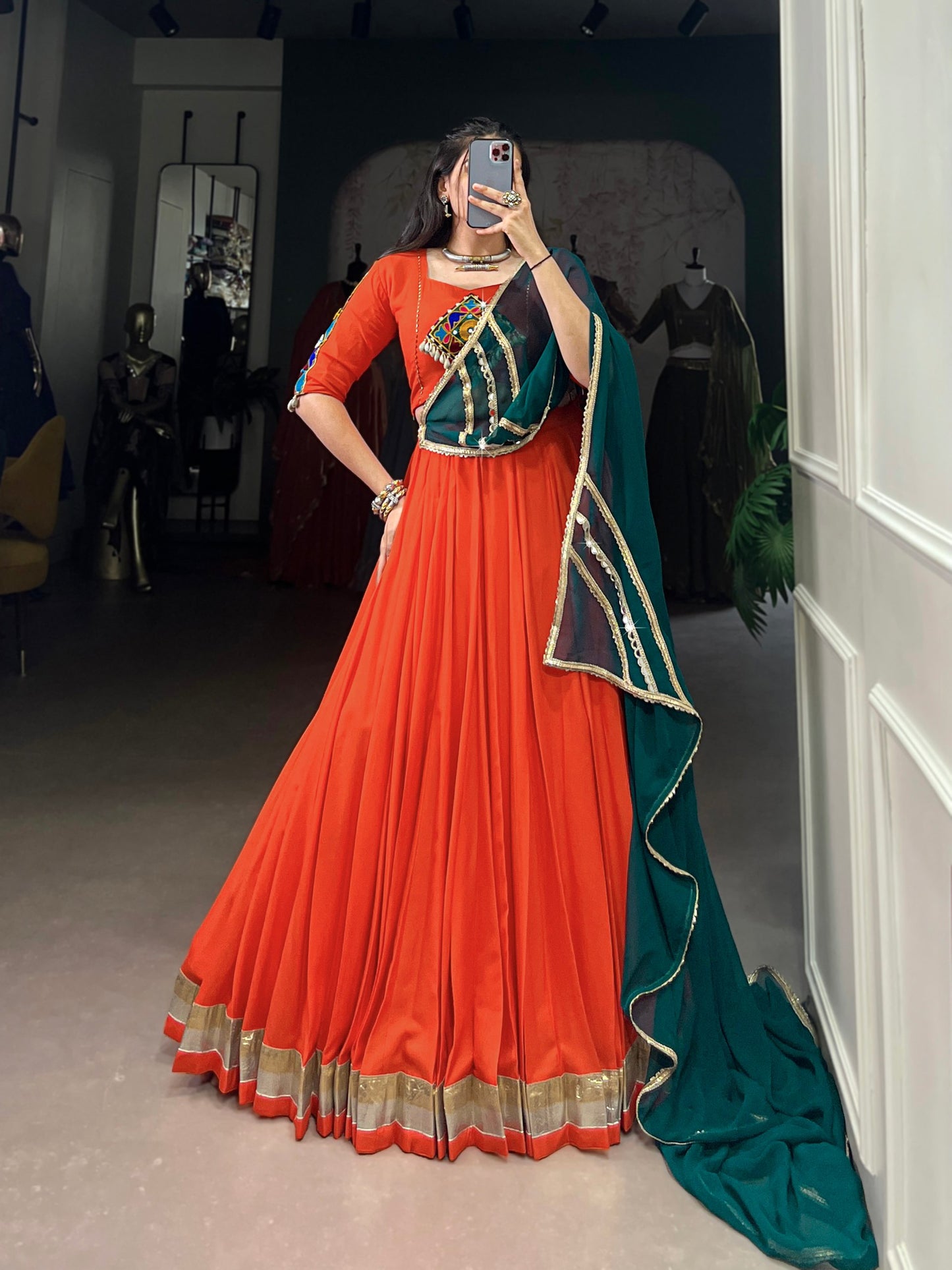 Magnificent Orange Pure Rayon Embossed Navratri Lehenga Choli