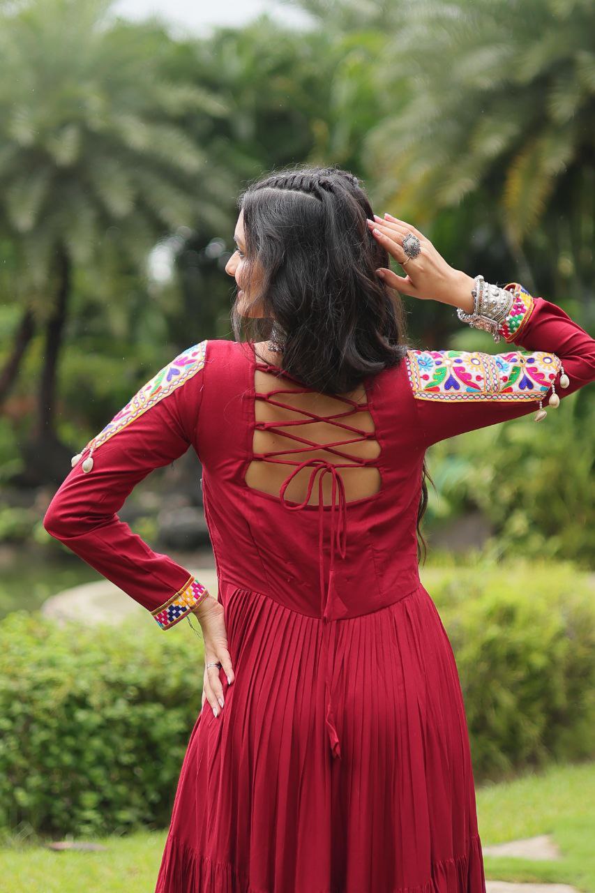 Maroon Rayon Kutchi Gamthi Work Gown – 12 Meter Flair & Fully Stitched