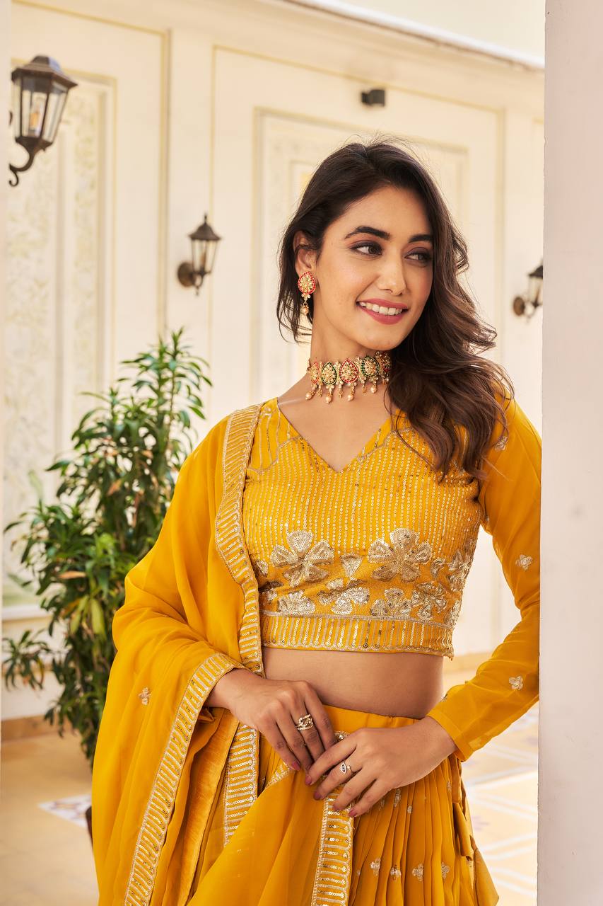 Elegant Faux Georgette Embroidered Lehenga Choli With Matching Dupatta