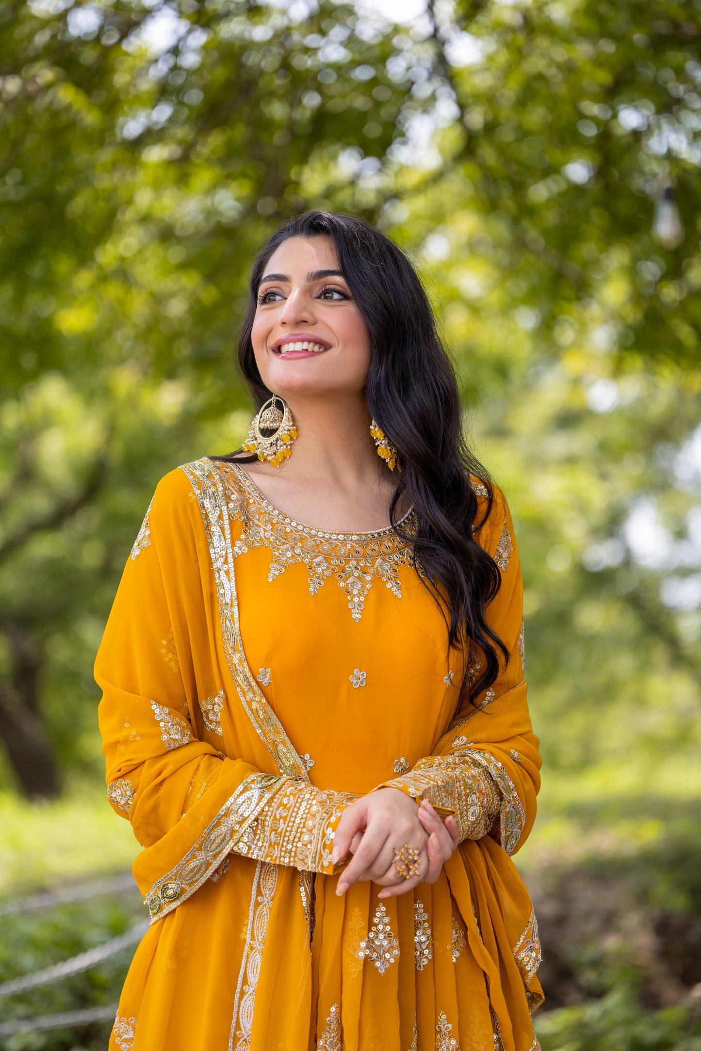 Luminous Mustard Yellow Faux Georgette Sequins Embroidered Anarkali Suit