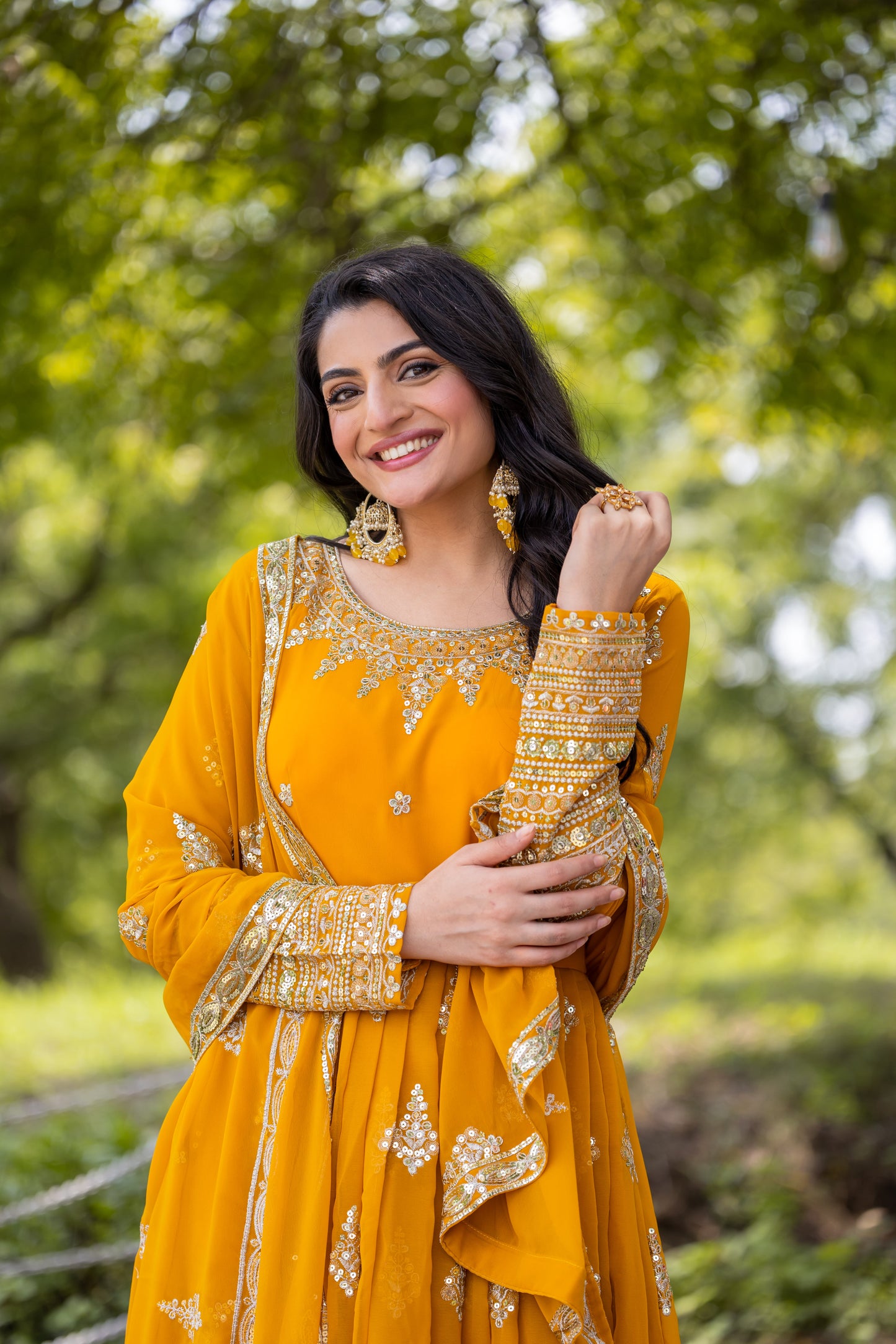 Luminous Mustard Yellow Faux Georgette Sequins Embroidered Anarkali Suit