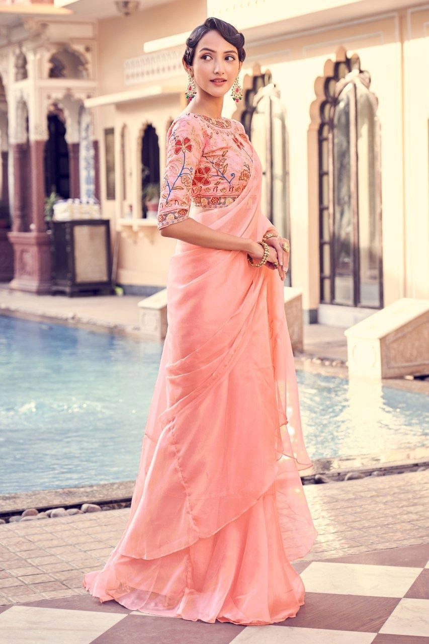 Graceful Peach Pink Organza Saree With Elegant Embroidery