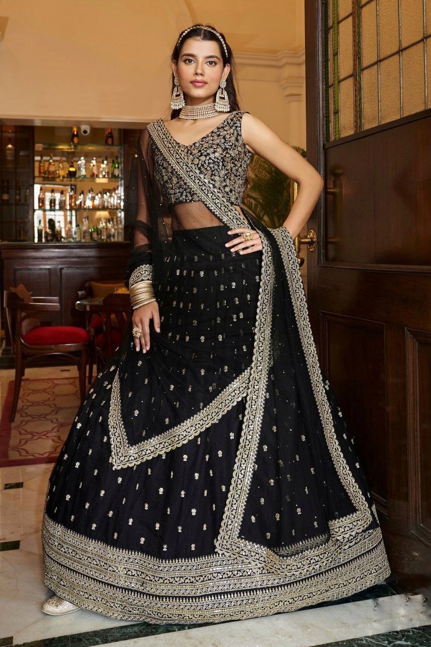 Graceful Black Soft Net Lehenga Set With Intricate Embroidery