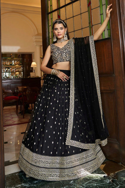 Graceful Black Soft Net Lehenga Set With Intricate Embroidery