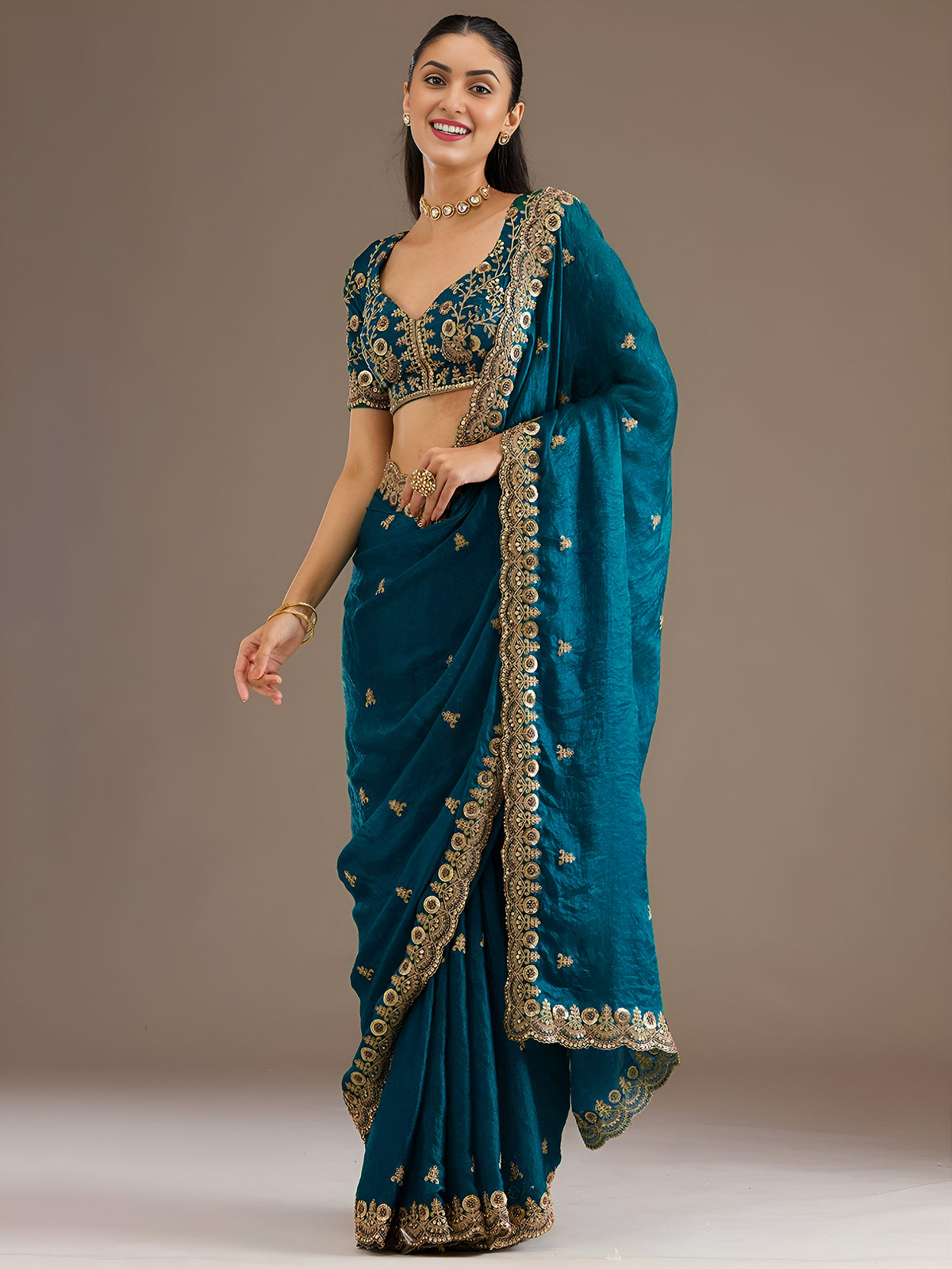 Teal Blue Silk Saree with Golden Embroidered Border