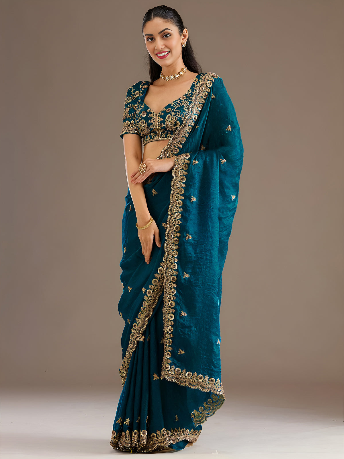 Teal Blue Silk Saree with Golden Embroidered Border