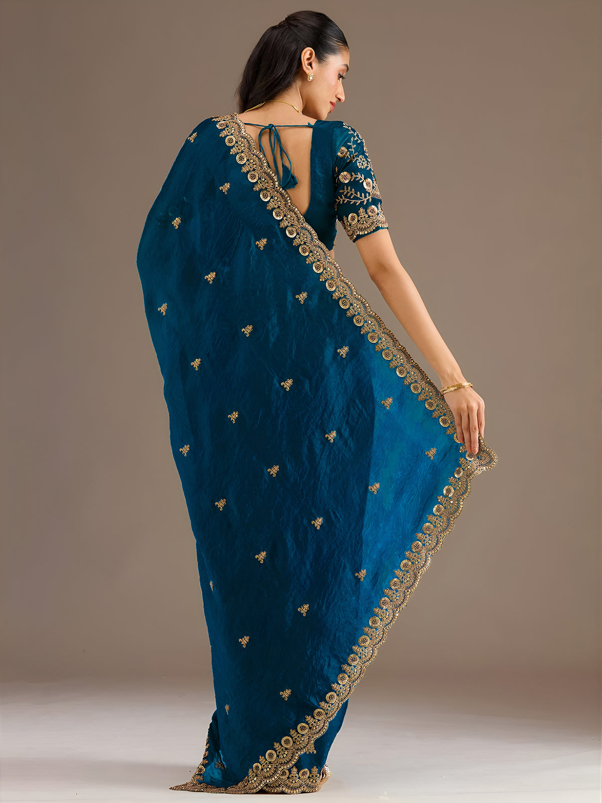 Teal Blue Silk Saree with Golden Embroidered Border