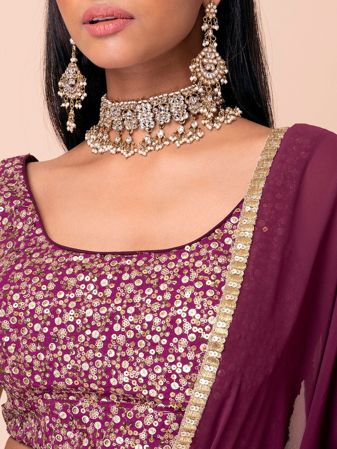 Wine Purple Embroidered Lehenga Choli with Gold Detailing