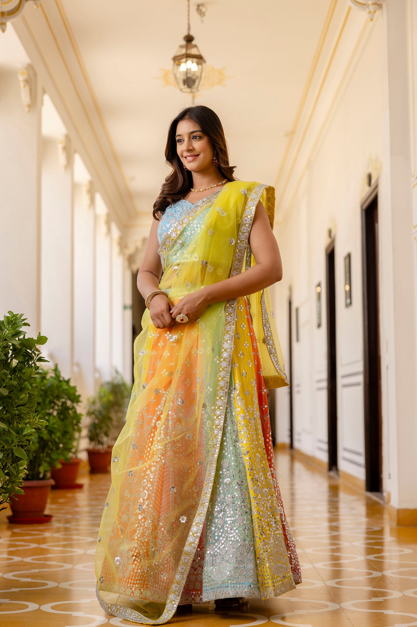 Multicolored Faux Georgette Sequins Thread Embroidered Lehenga Choli