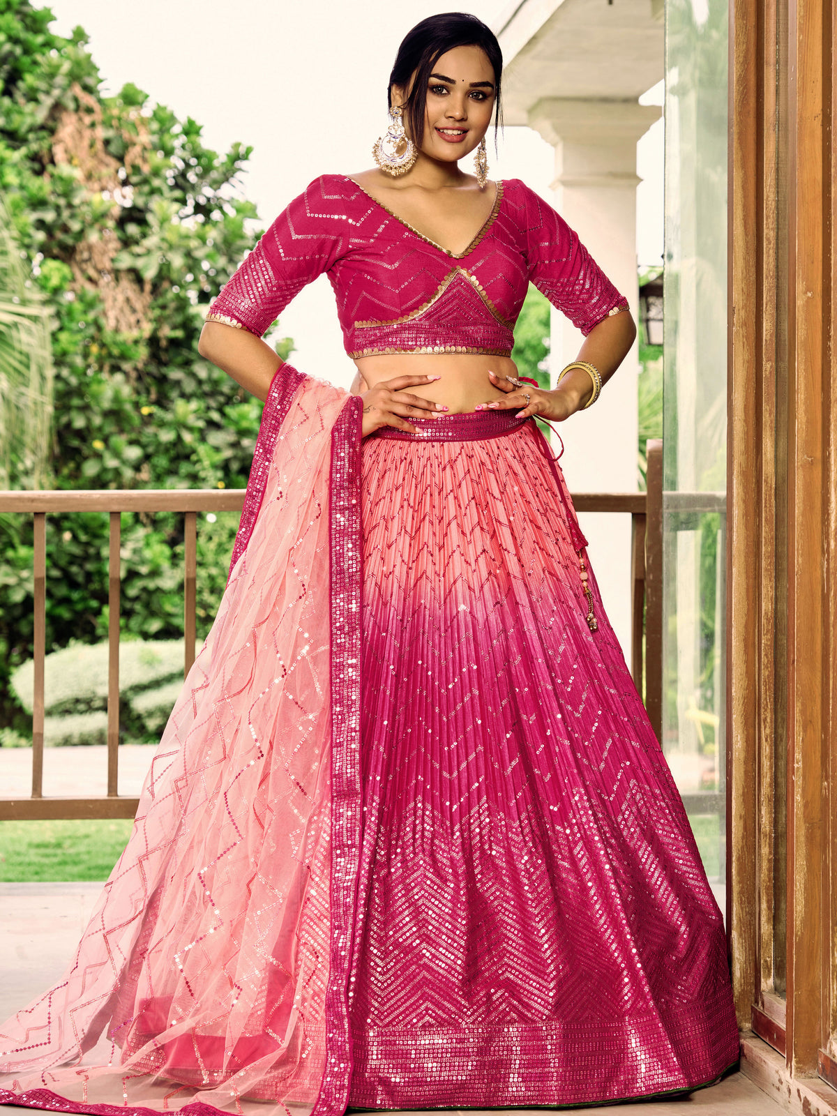 Rani Pink Lehenga Choli with Gold Chevron Work and Peach Dupatta