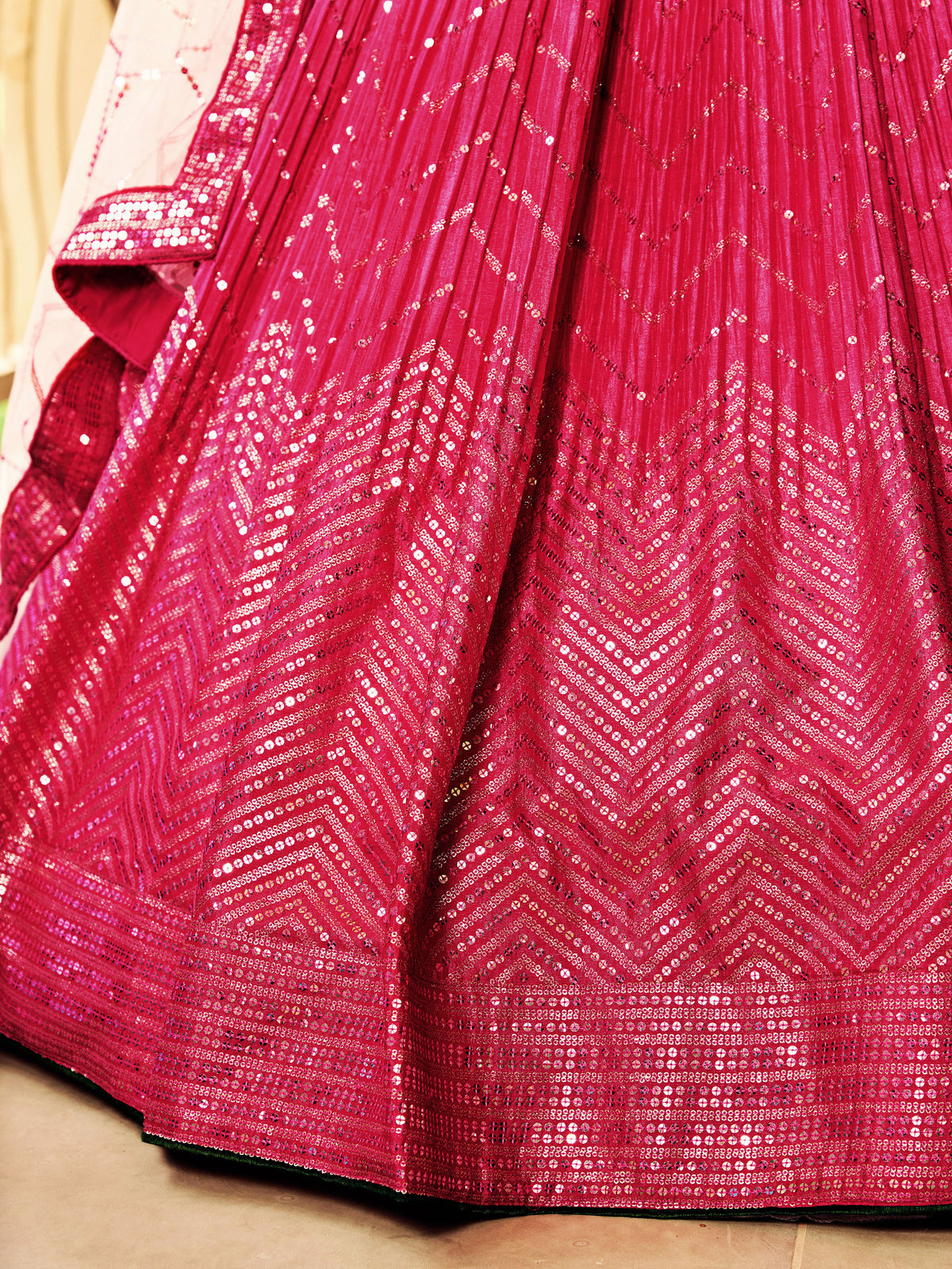 Rani Pink Lehenga Choli with Gold Chevron Work and Peach Dupatta