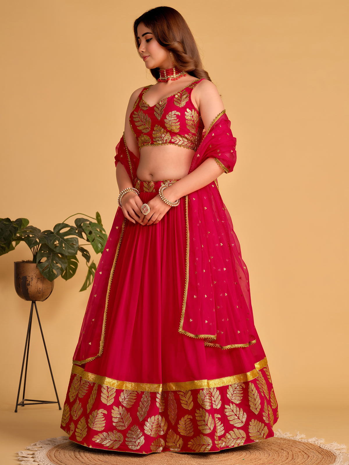 Rani Pink Lehenga Choli with Golden Leaf Embroidery and Designer Dupatta