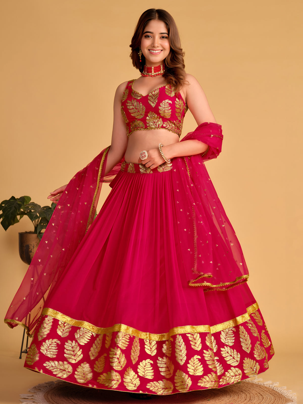Rani Pink Lehenga Choli with Golden Leaf Embroidery and Designer Dupatta