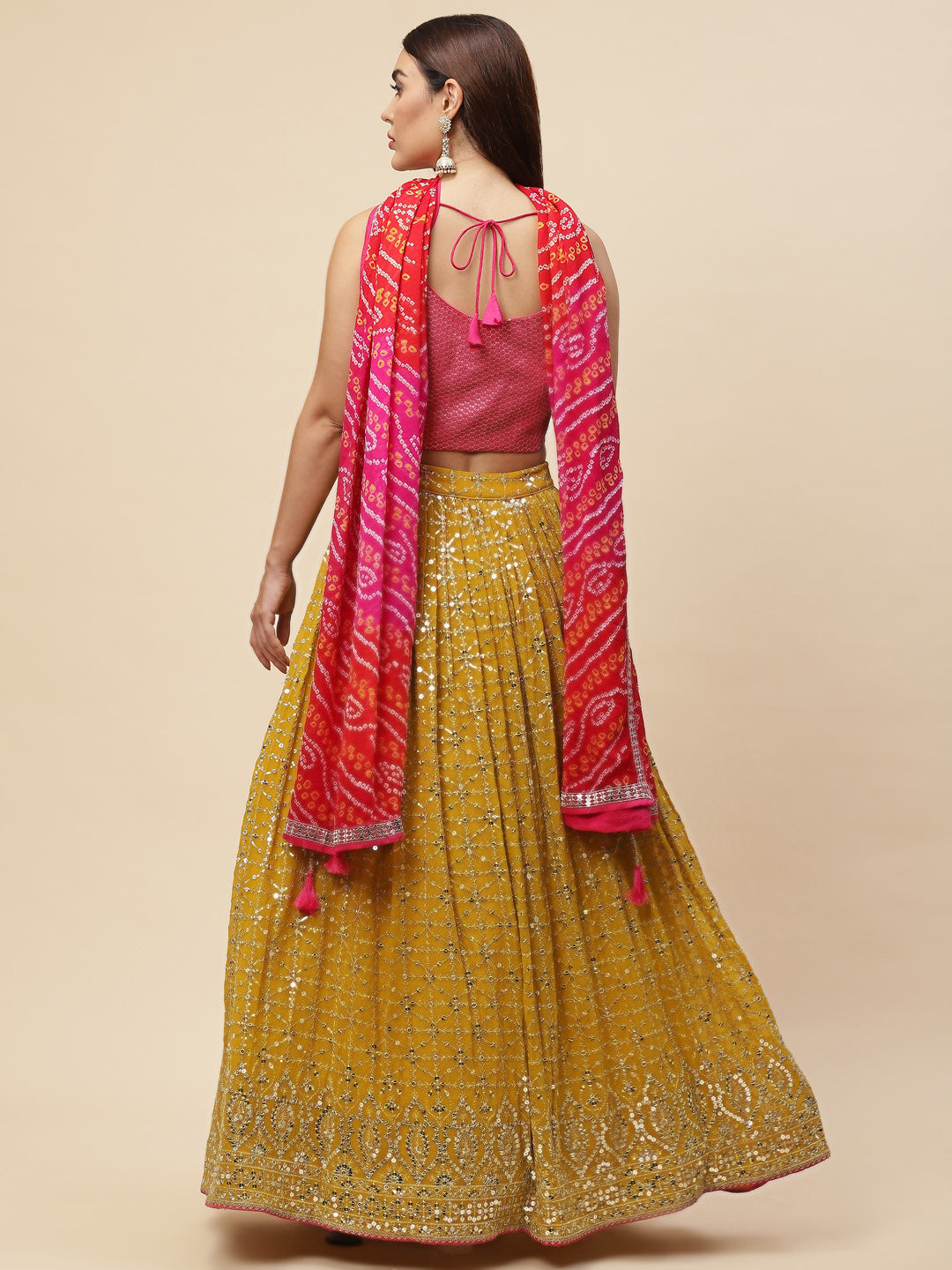 Mustard Yellow Bandhani Lehenga Choli with Pink Dupatta