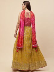 Mustard Yellow Bandhani Lehenga Choli with Pink Dupatta