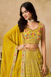 Mustard Yellow Lehenga Choli with Pink Floral Embroidery and Designer Dupatta