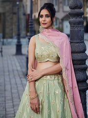 Pastel Mint Green Embroidered Bridal Lehenga Choli with Pink Dupatta