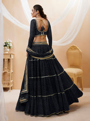 Black Tiered Lehenga Choli with Golden Lace Border