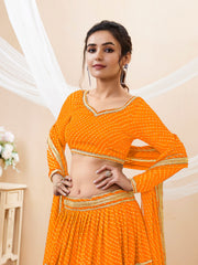 Bright Orange Tiered Lehenga Choli with Golden Lace