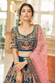 Royal Blue Bridal Lehenga Choli with Pink and Gold Floral Embroidery