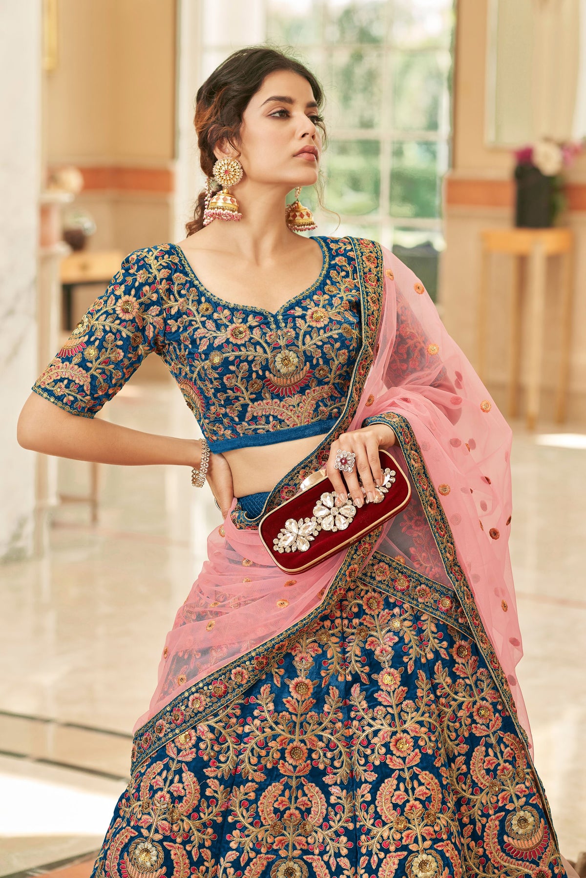 Royal Blue Bridal Lehenga Choli with Pink and Gold Floral Embroidery