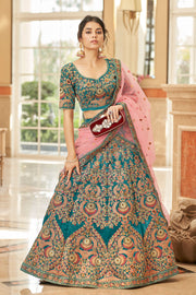Teal Blue Bridal Lehenga Choli with Pink and Gold Floral Embroidery