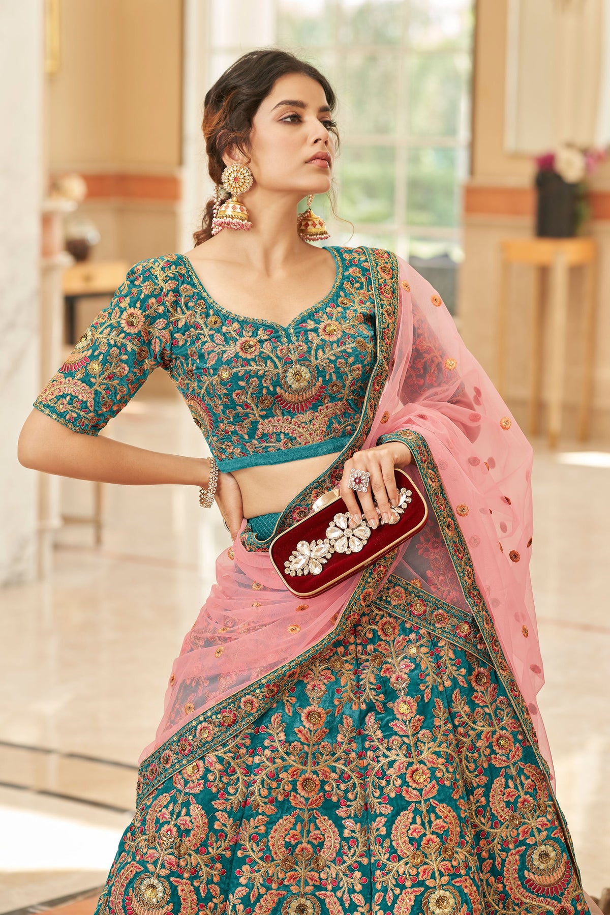 Teal Blue Bridal Lehenga Choli with Pink and Gold Floral Embroidery