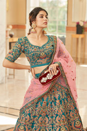 Teal Blue Bridal Lehenga Choli with Pink and Gold Floral Embroidery