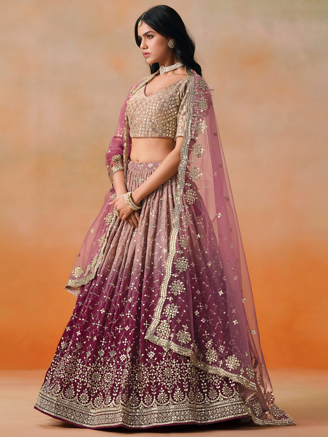 Mauve Maroon Lehenga Choli with Gold Floral Embroidery and Pink Dupatta