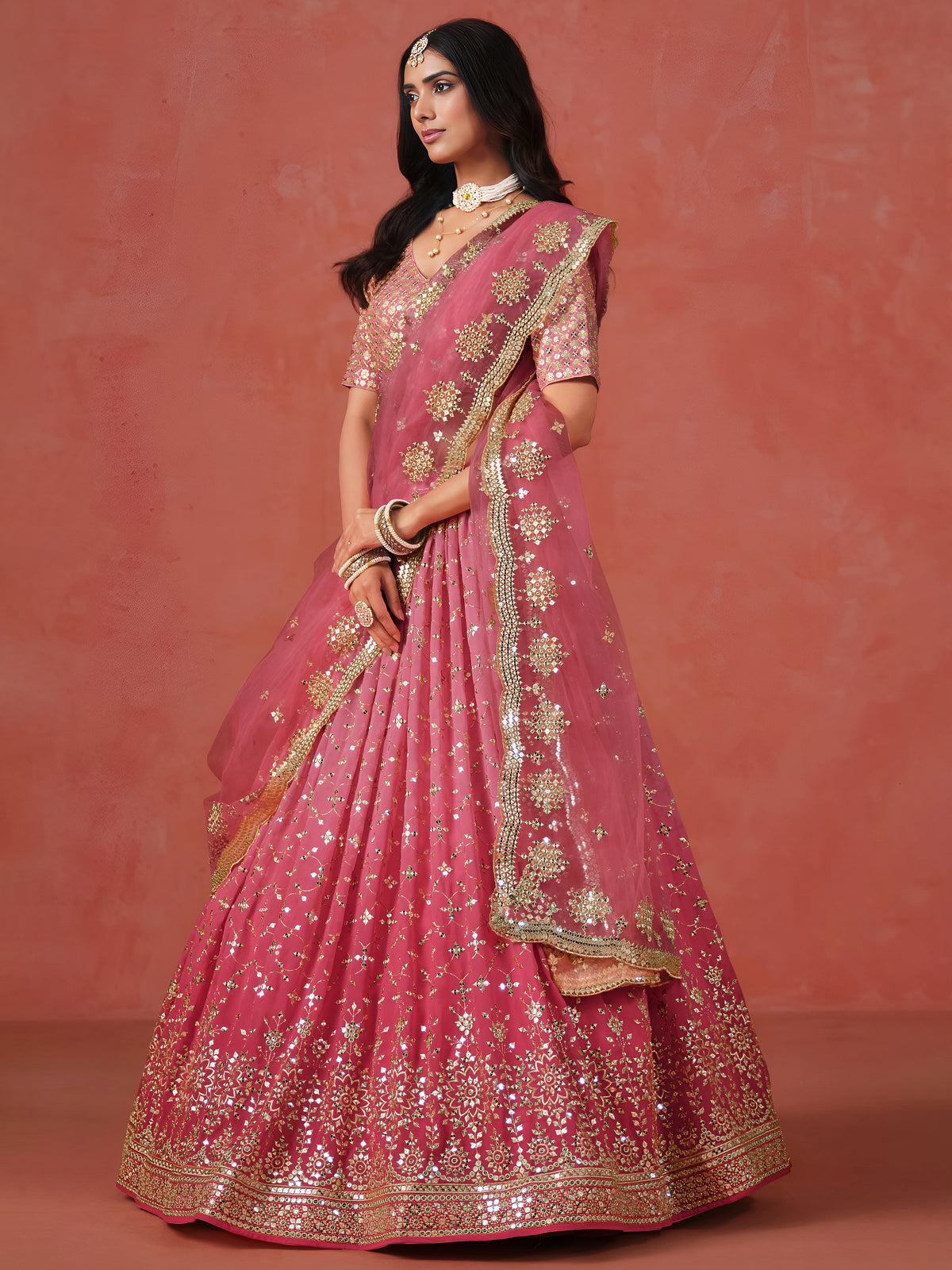 Peach Pink Lehenga Choli with Gold Floral Embroidery and Matching Dupatta