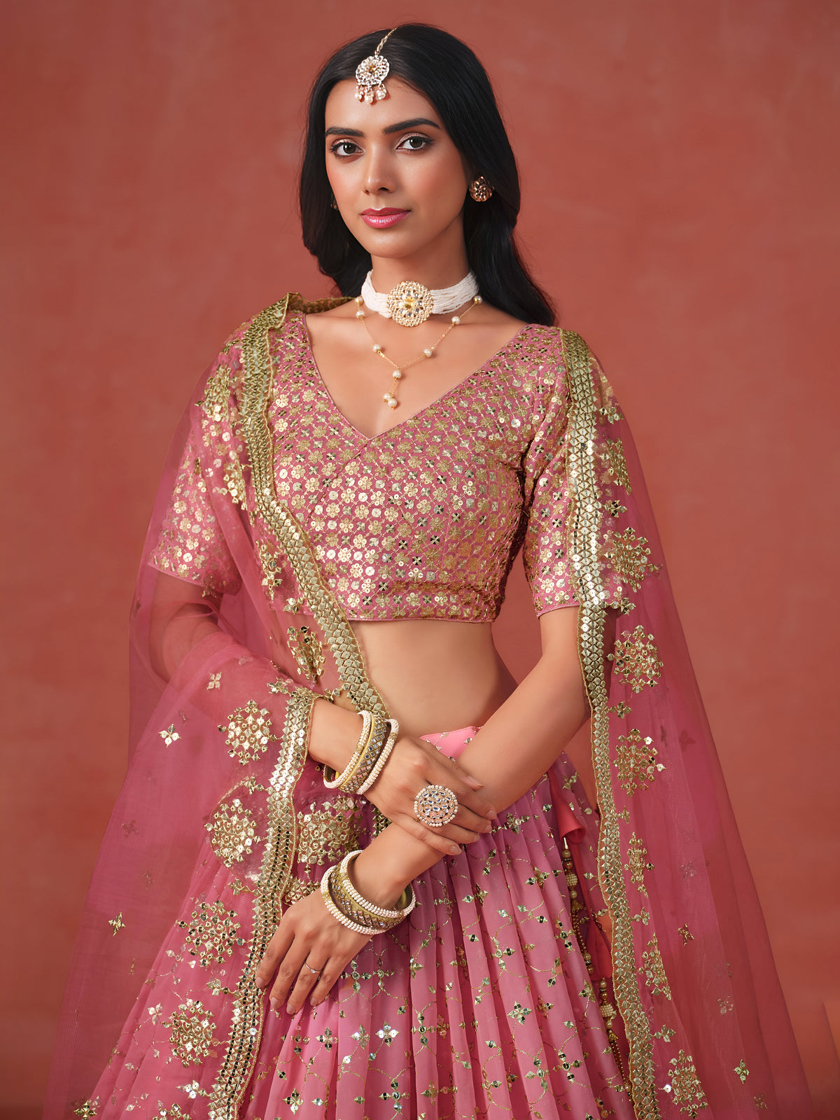 Peach Pink Lehenga Choli with Gold Floral Embroidery and Matching Dupatta