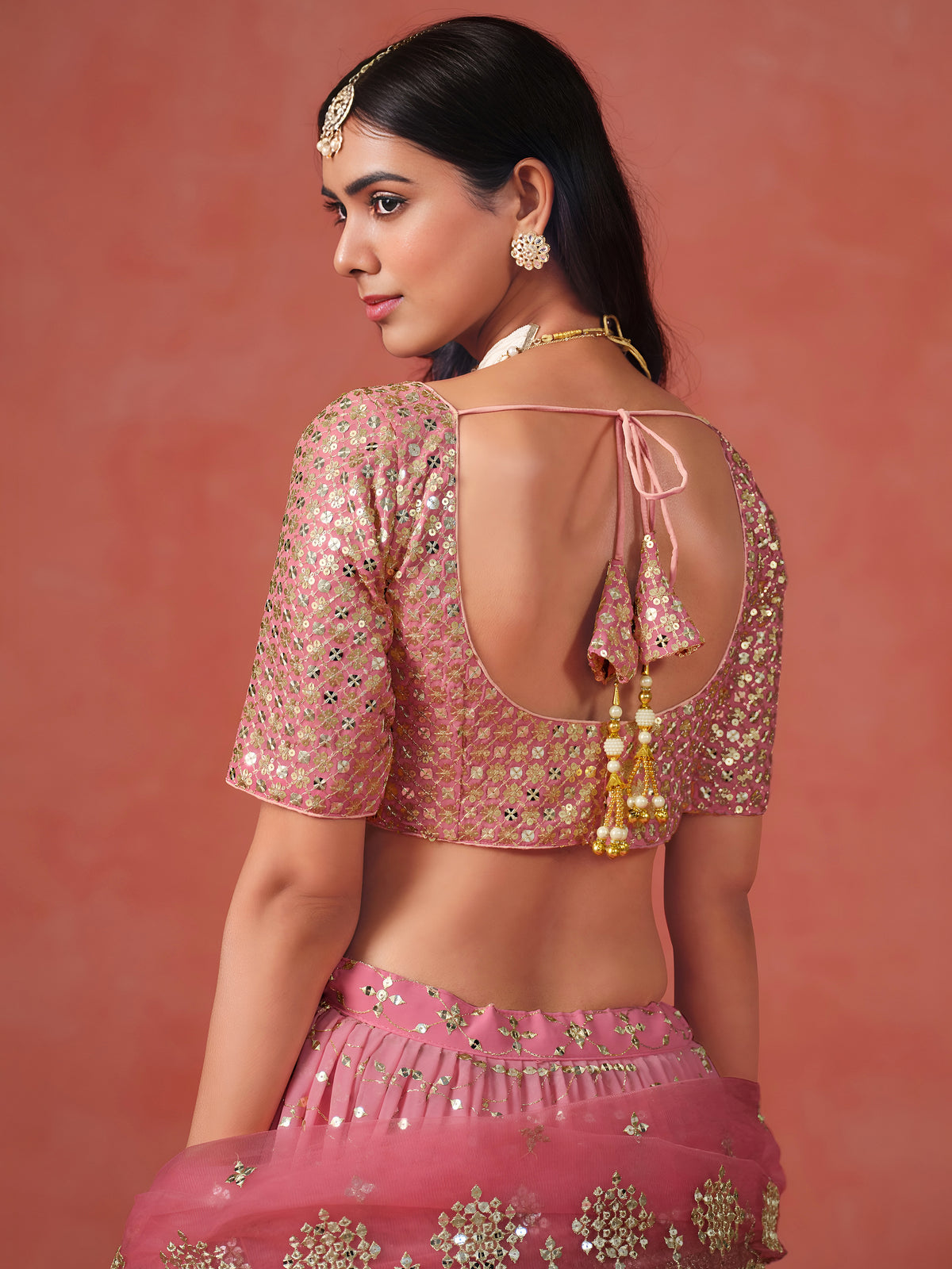 Peach Pink Lehenga Choli with Gold Floral Embroidery and Matching Dupatta