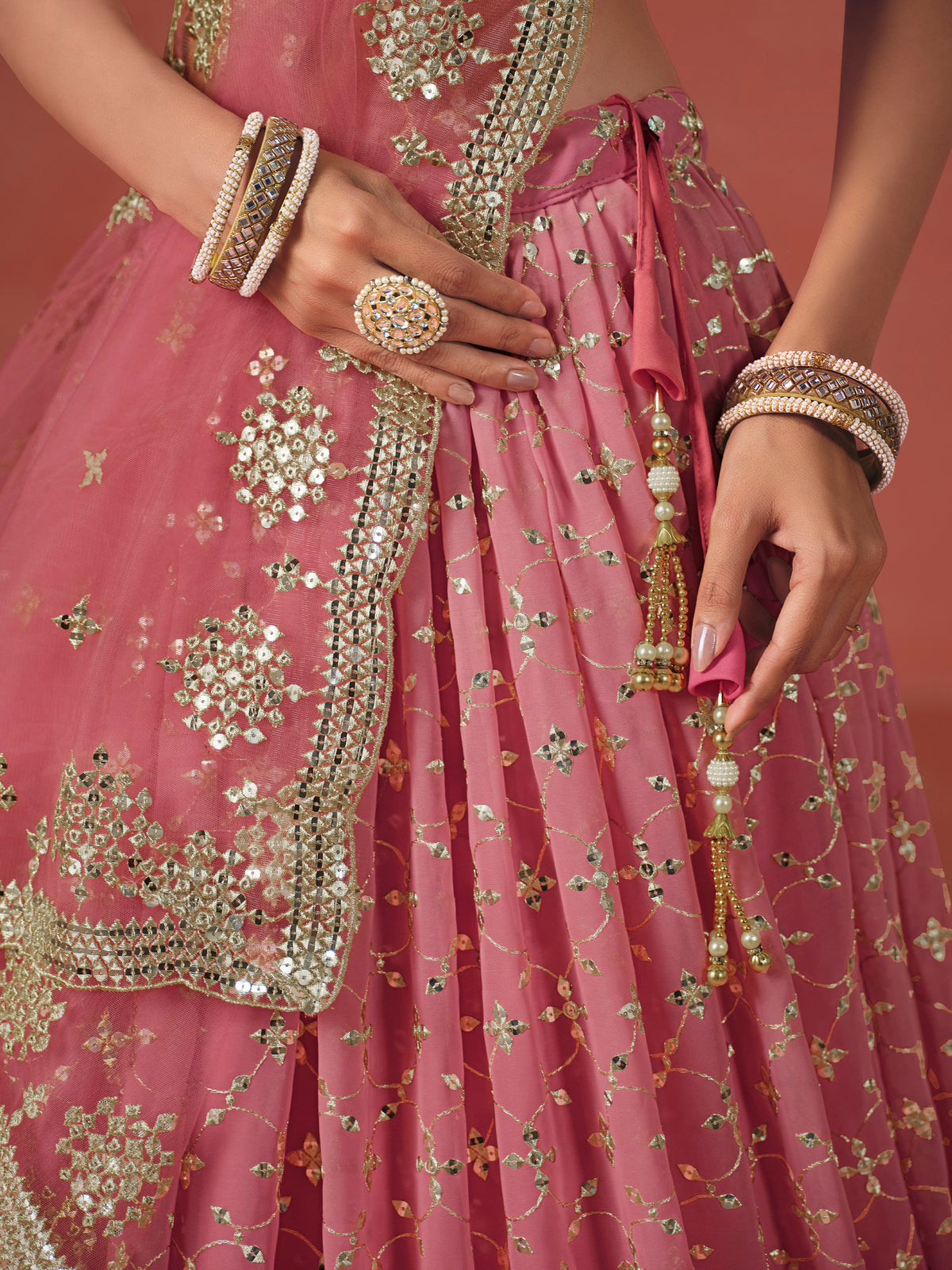 Peach Pink Lehenga Choli with Gold Floral Embroidery and Matching Dupatta