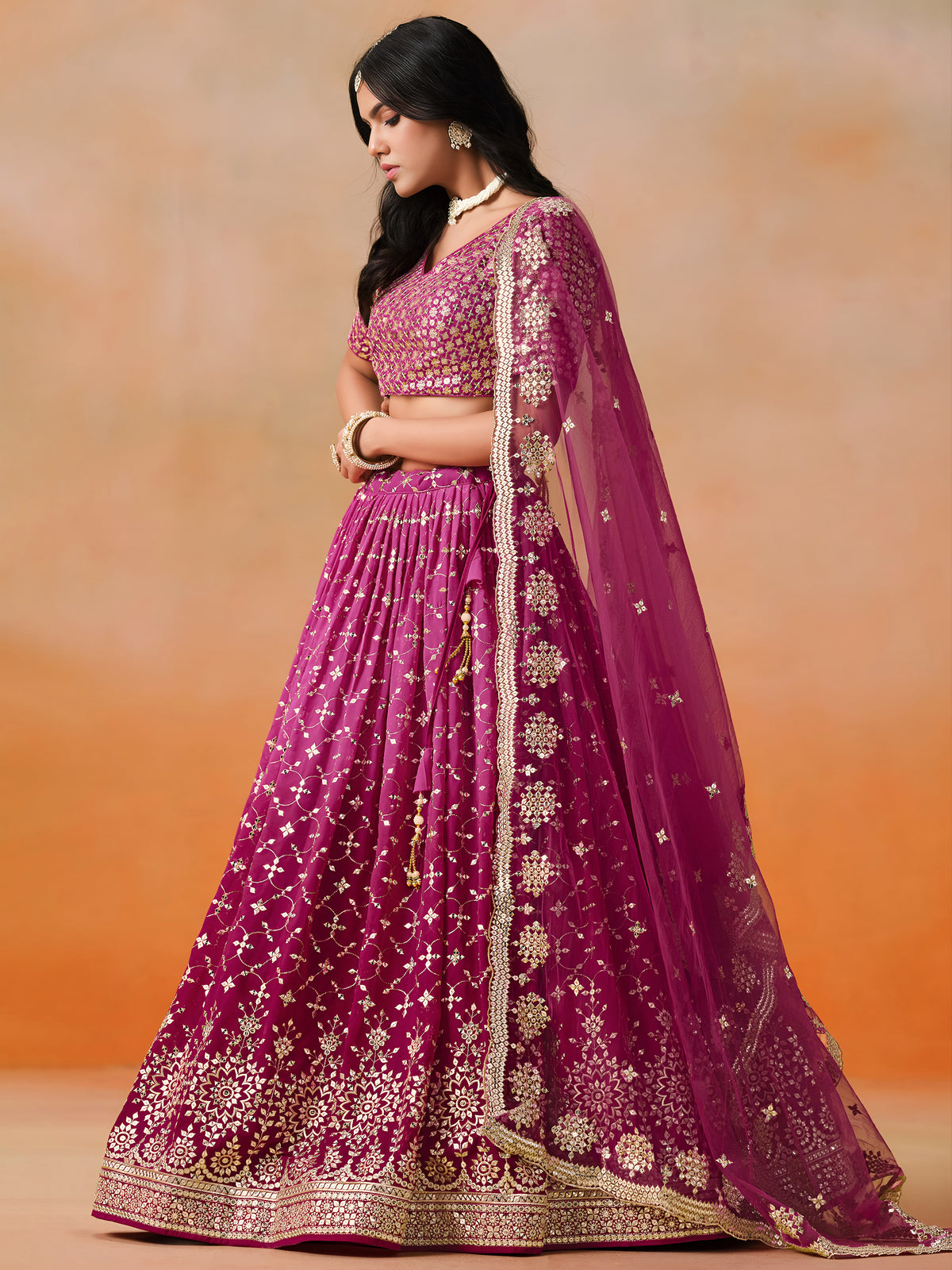 Rani Pink Lehenga Choli with Gold Floral Embroidery and Matching Dupatta