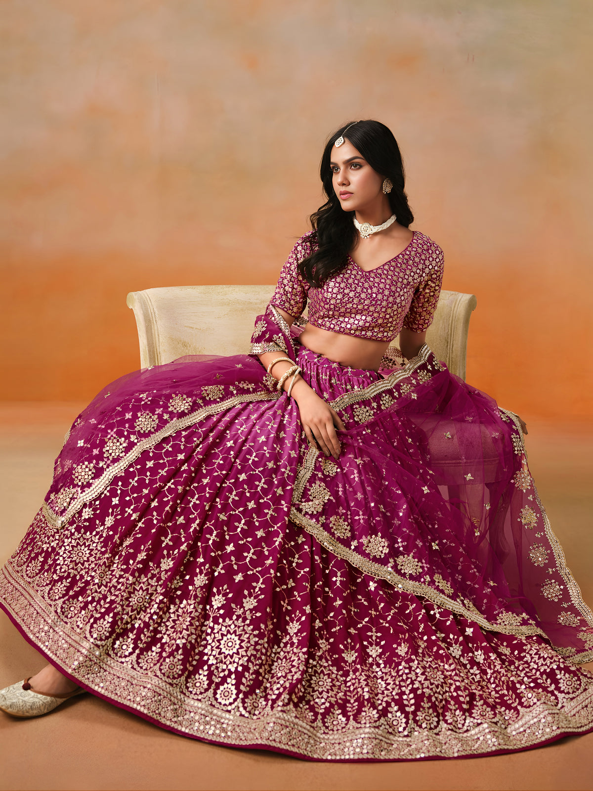 Rani Pink Lehenga Choli with Gold Floral Embroidery and Matching Dupatta