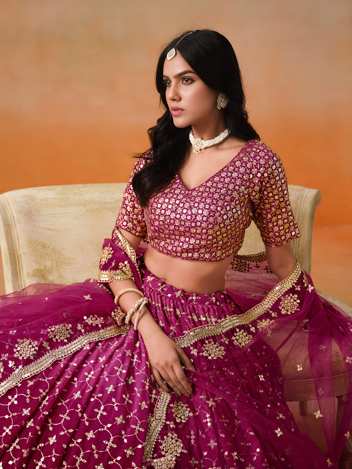 Rani Pink Lehenga Choli with Gold Floral Embroidery and Matching Dupatta