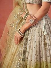 Lime Yellow Lehenga Choli with Silver-Gold Embroidery and Sheer Dupatta