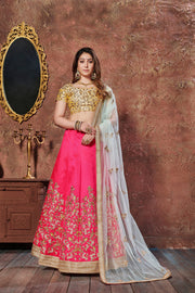 Hot Pink and Golden Embroidered Bridal Lehenga Choli with Ivory Dupatta