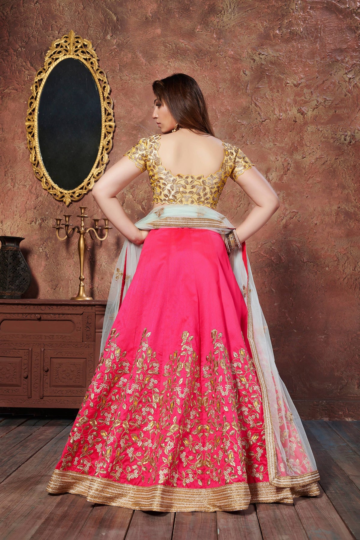 Hot Pink and Golden Embroidered Bridal Lehenga Choli with Ivory Dupatta
