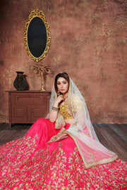 Hot Pink and Golden Embroidered Bridal Lehenga Choli with Ivory Dupatta