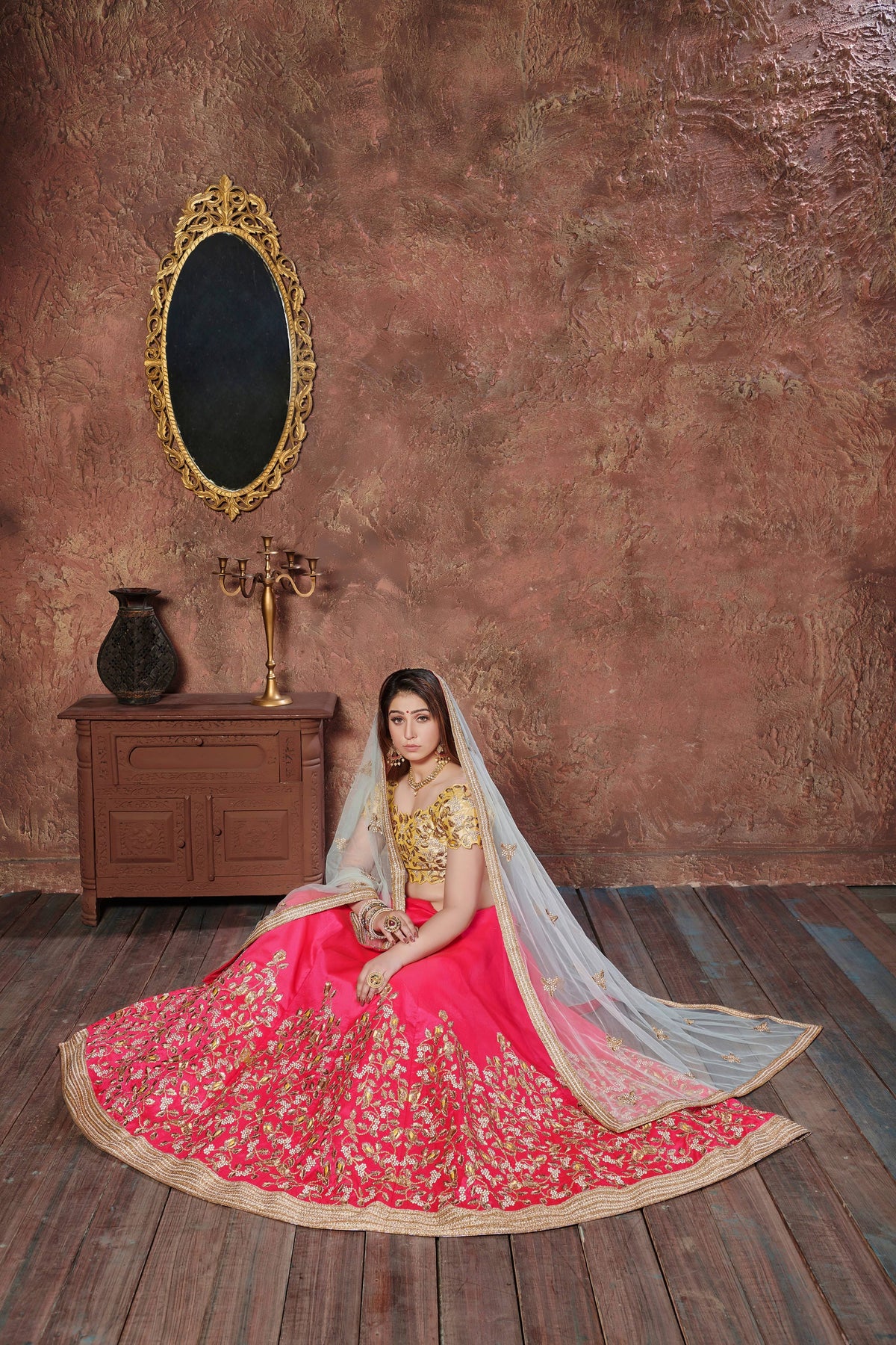 Hot Pink and Golden Embroidered Bridal Lehenga Choli with Ivory Dupatta