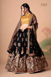 Black and Mustard Yellow Embroidered Lehenga Choli with Floral Dupatta