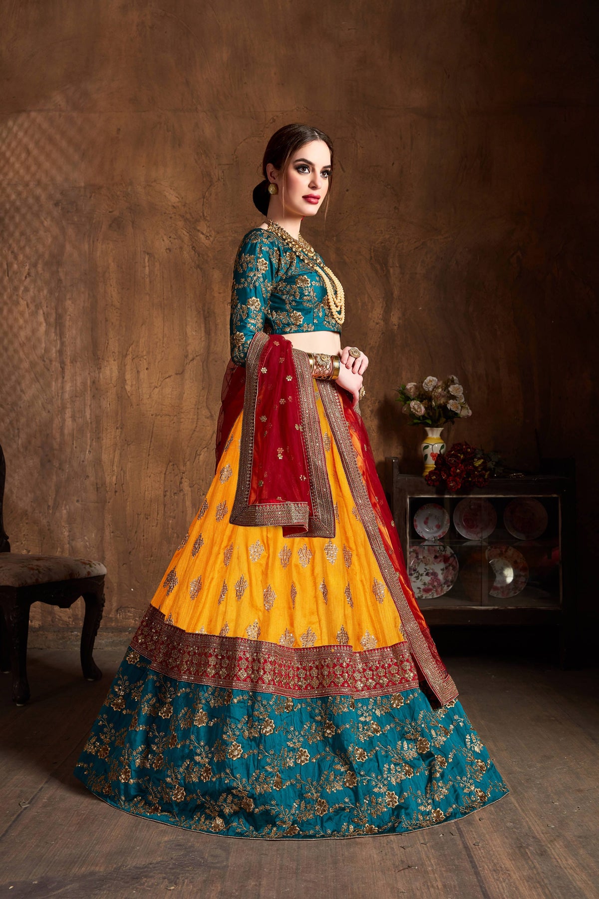 Mustard Yellow and Teal Embroidered Bridal Lehenga Choli with Red Dupatta