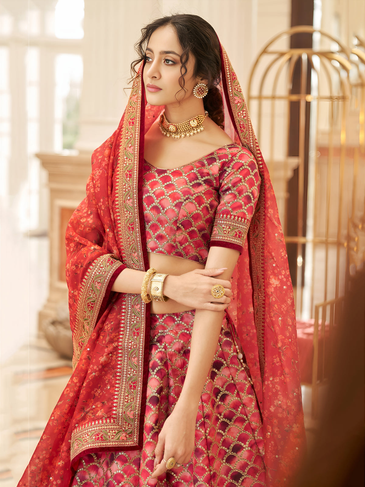 Rani Pink Bridal Lehenga Choli with Golden Embroidery & Red Floral Dupatta