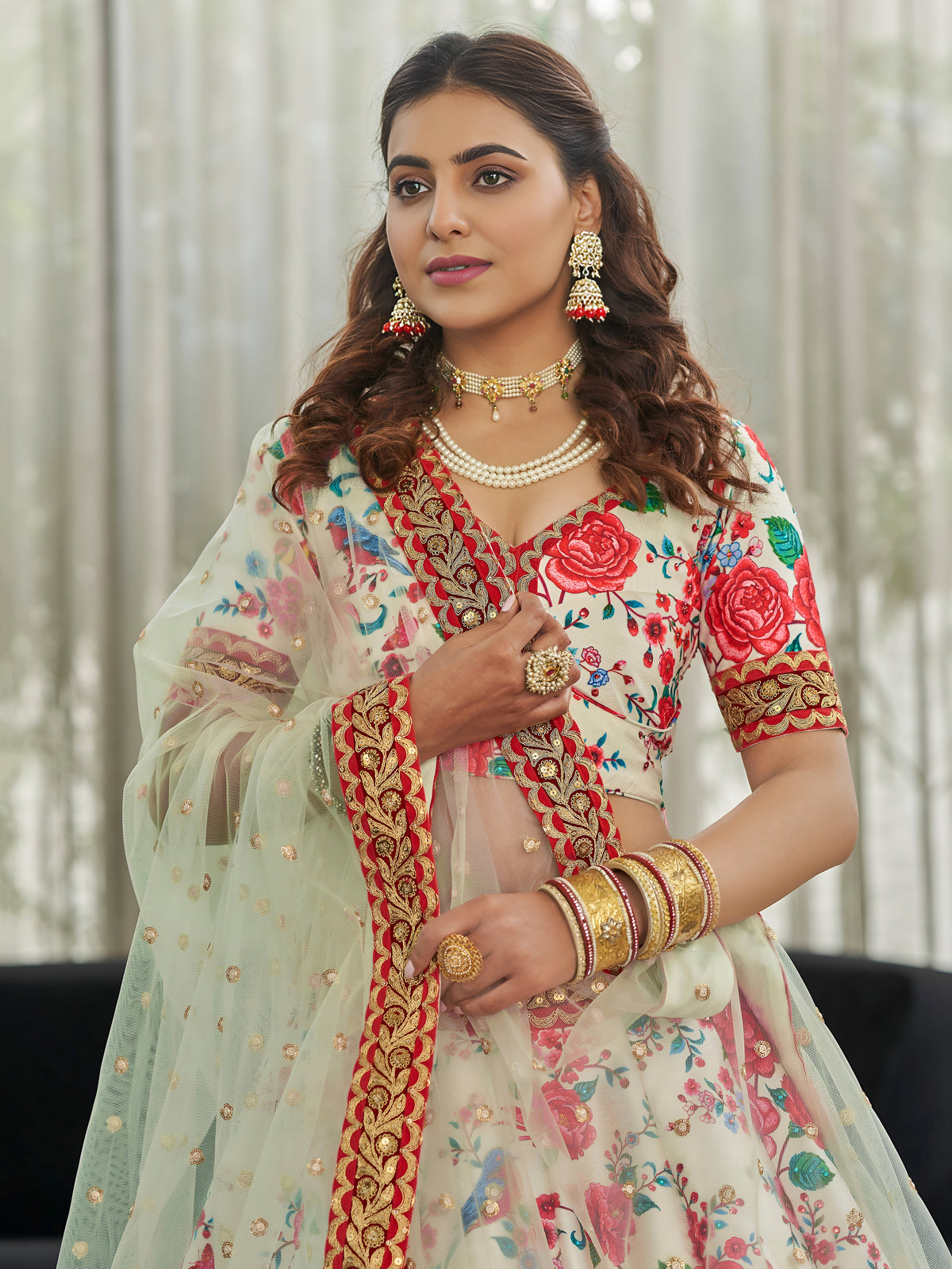 White Floral Lehenga Choli with Red Roses and Gold Embroidered Dupatta